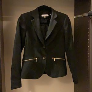 Black suit jacket with gold hardware